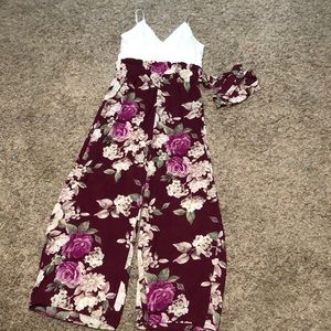 The brand is Rue 21. The size is a large and the color is white and maroon.